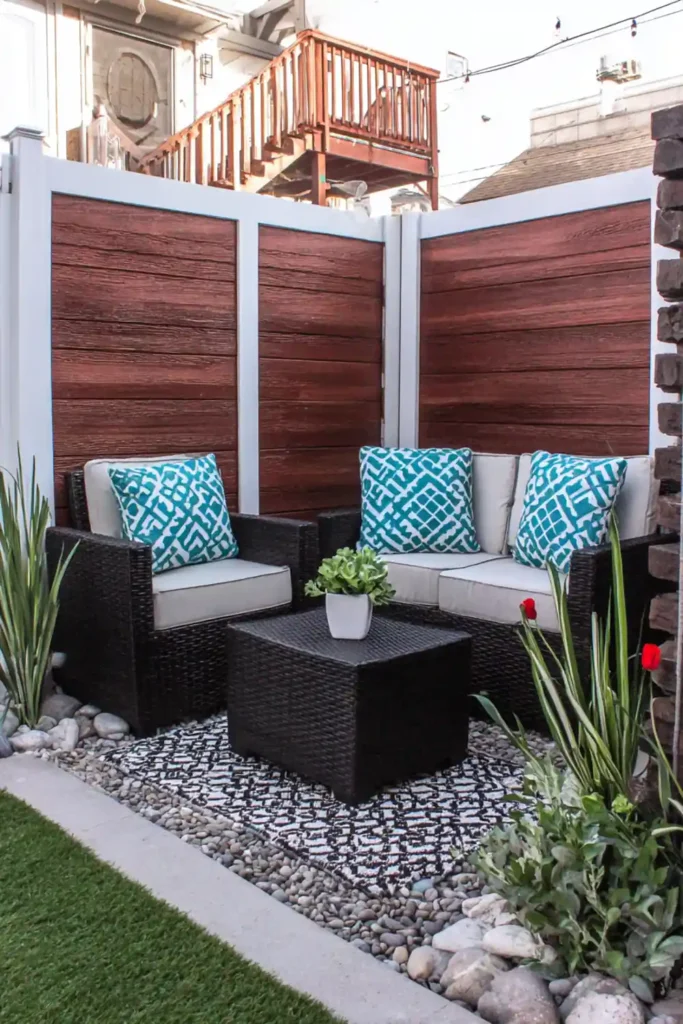 33 Privacy Fence Ideas That Make Your Yard Feel More Peaceful 28 Composite wood privacy fence panels in a modern residential backyard