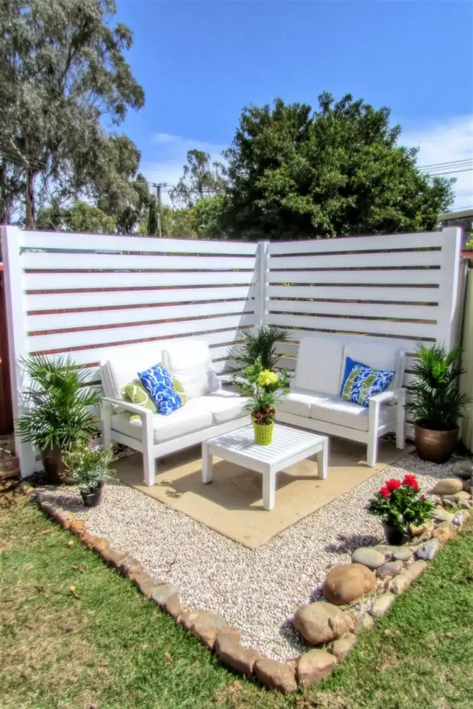 33 Privacy Fence Ideas That Make Your Yard Feel More Peaceful 20 Modern backyard with horizontal wood board privacy fence painted grey