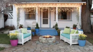 cozy patio and porch decorations with string lights, fire pit, and seating area