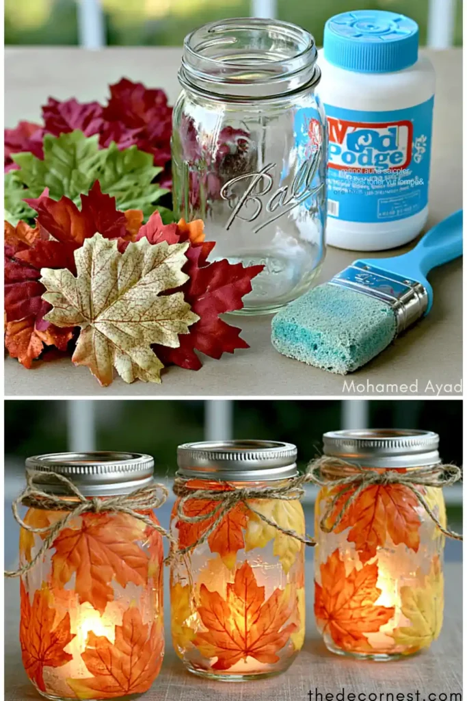 Fall leaf mason jar luminaries with glowing jars covered in orange and yellow leaves and tied with twine.