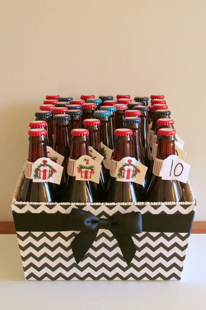 DIY bottle advent calendar for adults featuring assorted brown glass bottles with numbered decorative tags arranged in a black-and-white patterned gift basket.
